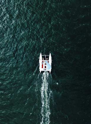 Operate sailing catamaran